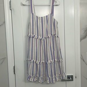 White dress with blue, red, and pink stripes